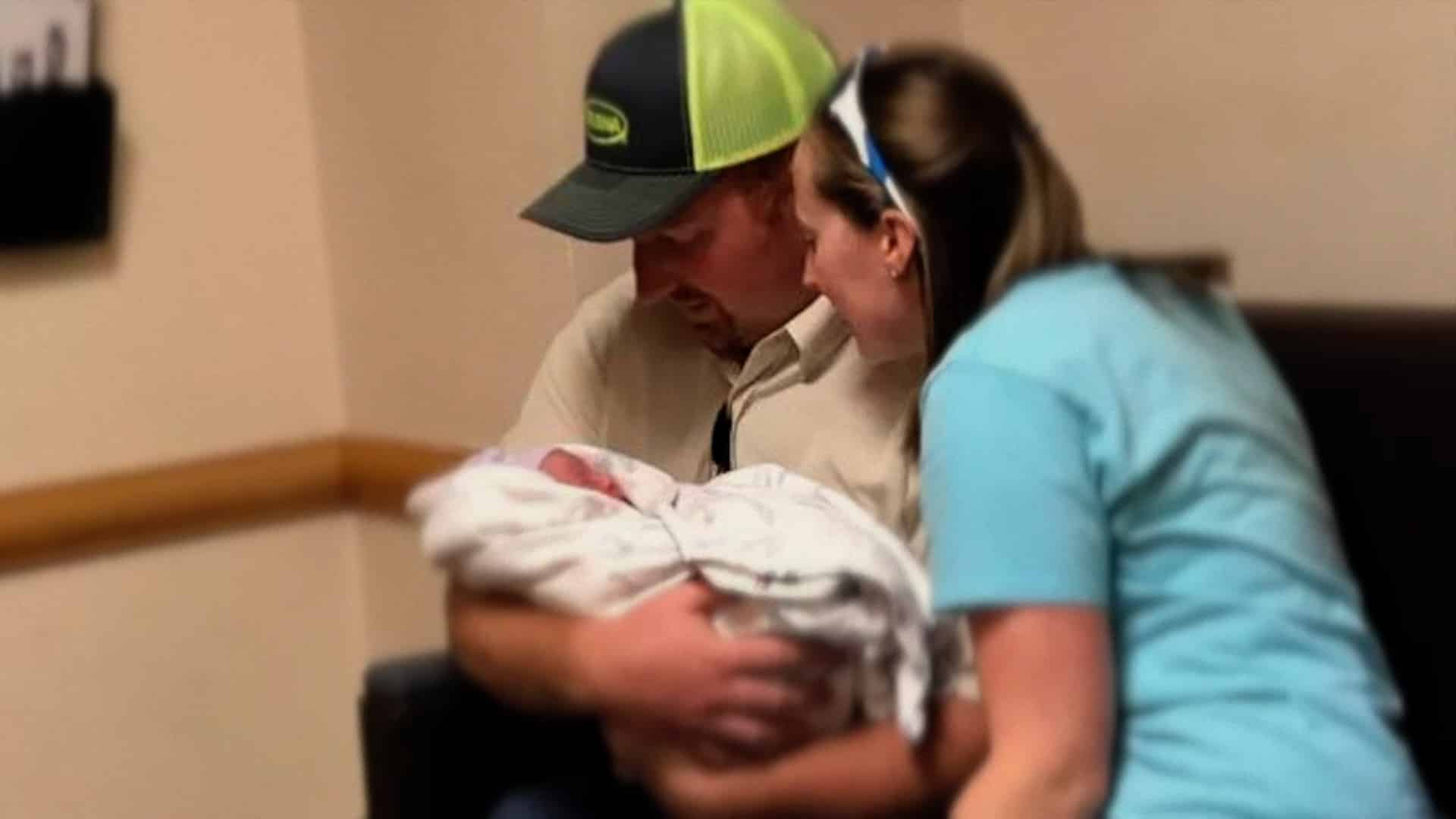 couple with newborn baby