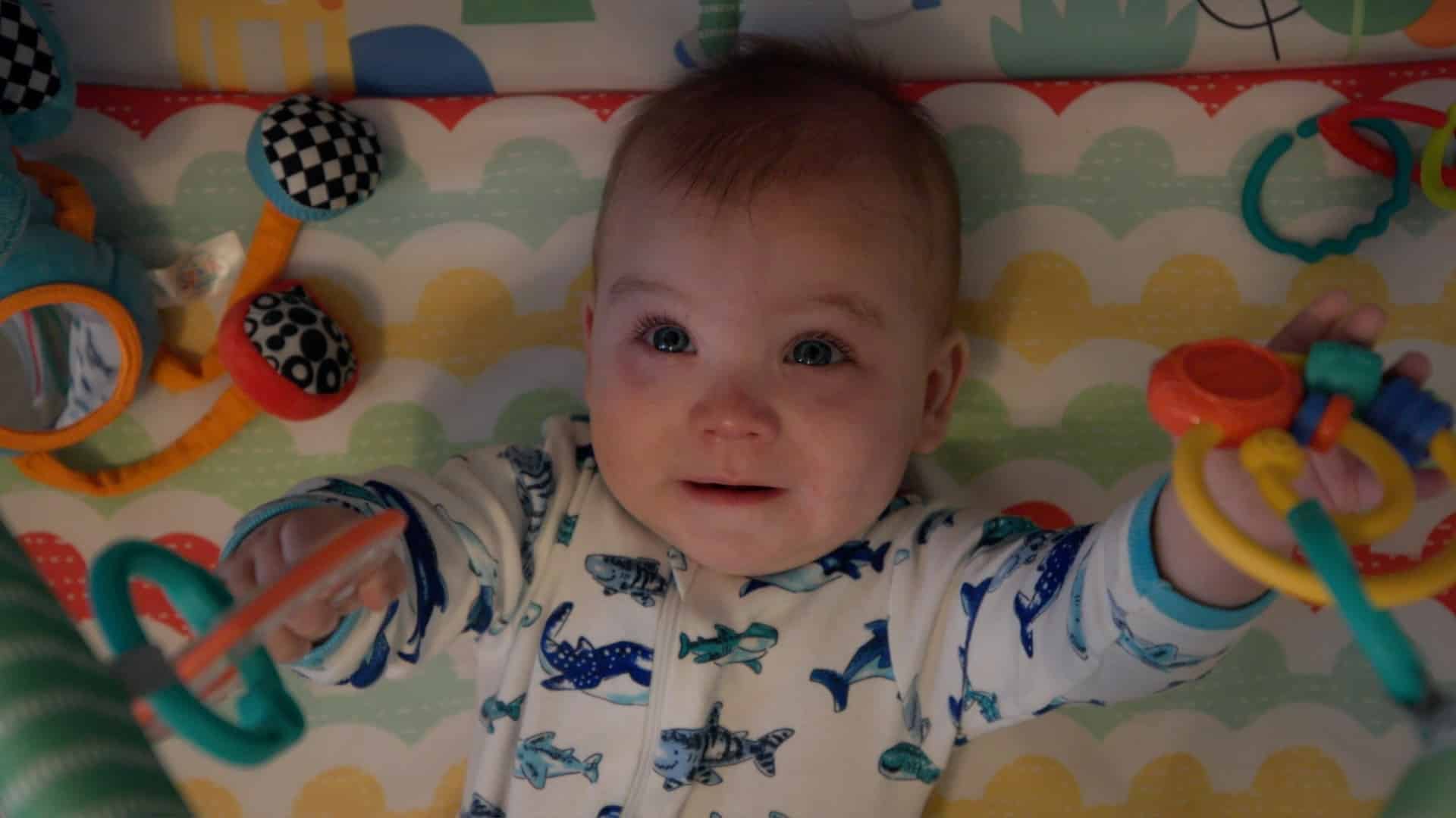 baby on play mat